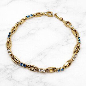 Vintage Gold Tone Bracelet Blue & Clear Rhinestones Fold Over Clasp 7"